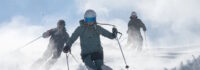 skifahrende beim Skiguiding